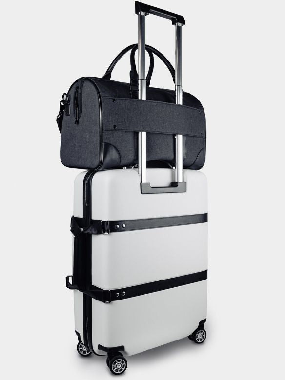 legacy c33 duffel bag black nylon weekender back paired with p55 carry- on white