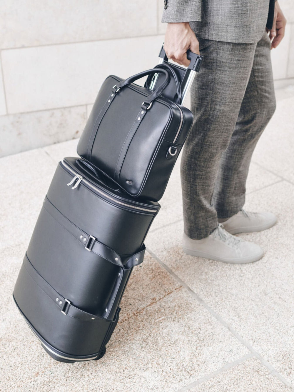 f38 leather carry-on luggage with f25 business briefcase in black leather schwarzes leder