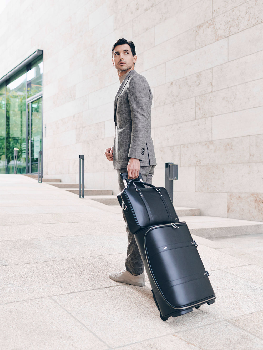 f38 leather carry-on luggage with f25 business briefcase in black leather schwarzes leder